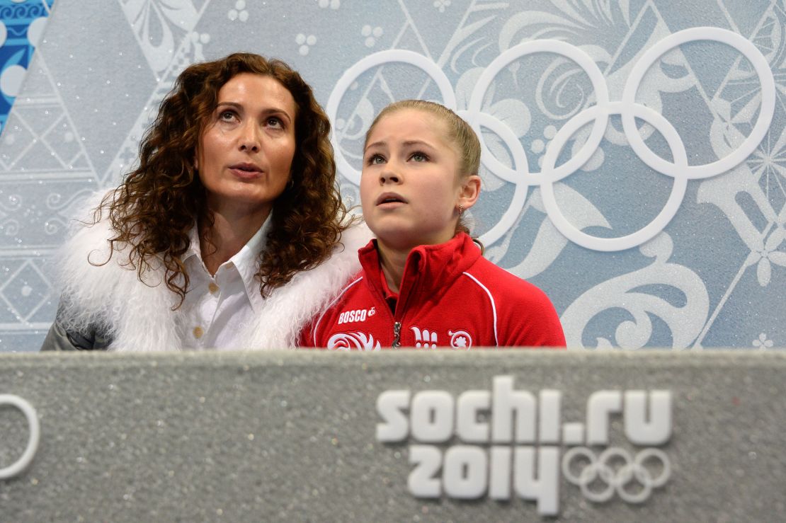 Yulia Lipnitskaia (R) and her coach Eteri Tutberidze during the Sochi Winter Olympics on February 20, 2014. 