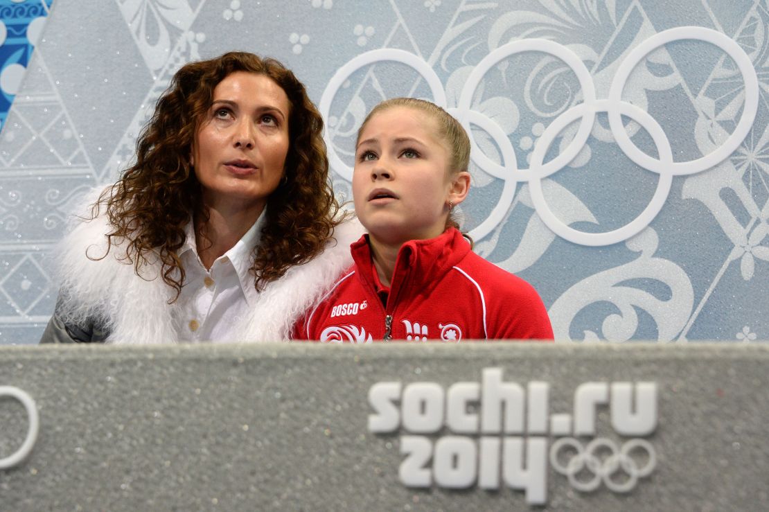 Yulia Lipnitskaia (R) and her coach Eteri Tutberidze during the Sochi Winter Olympics on February 20, 2014.
