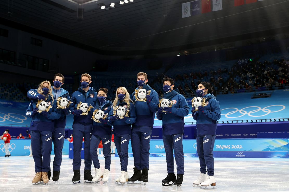 Silver medalists Team USA pose during the team event flower ceremony.