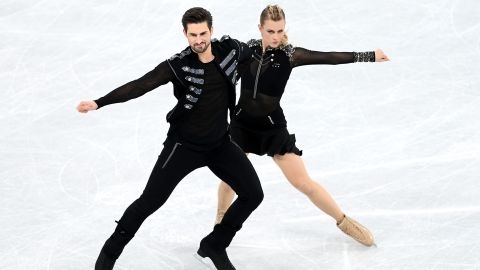 Hubbell and Donohue skate in the ice dance rhythm dance team event.