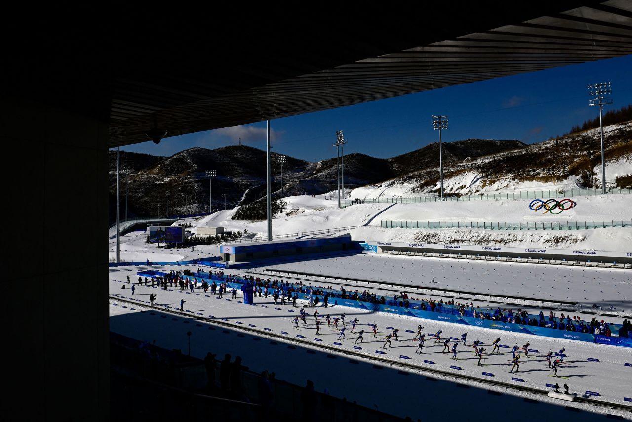 Biathletes compete in a mass start event on February 18.
