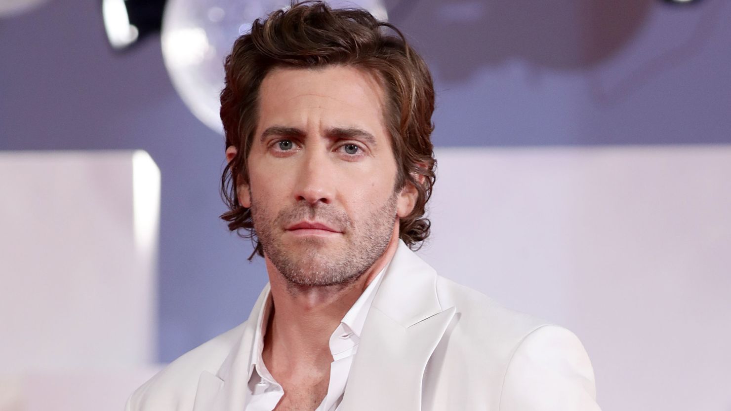 Jake Gyllenhaal, seen here at the premiere of "The Lost Daughter" during the 78th Venice International Film Festival on September 03, 2021 in Venice, Italy, is set to lead the cast in a "Road House" remake. 