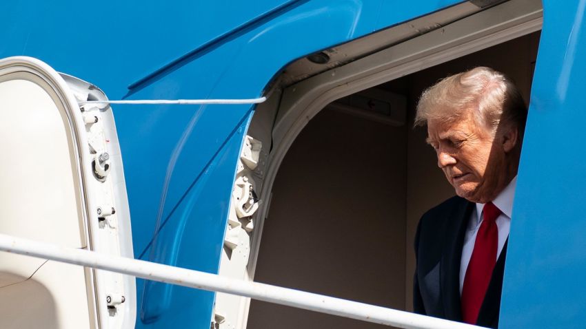 Outgoing US President Donald Trump steps off Air Force One as he arrives at Palm Beach International Airport in West Palm Beach, Florida, on January 20, 2021. 