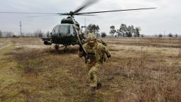 Service members of the Ukrainian Air Assault Forces partake in tactical drills at a training ground in an unknown location in Ukraine, on February 18. 