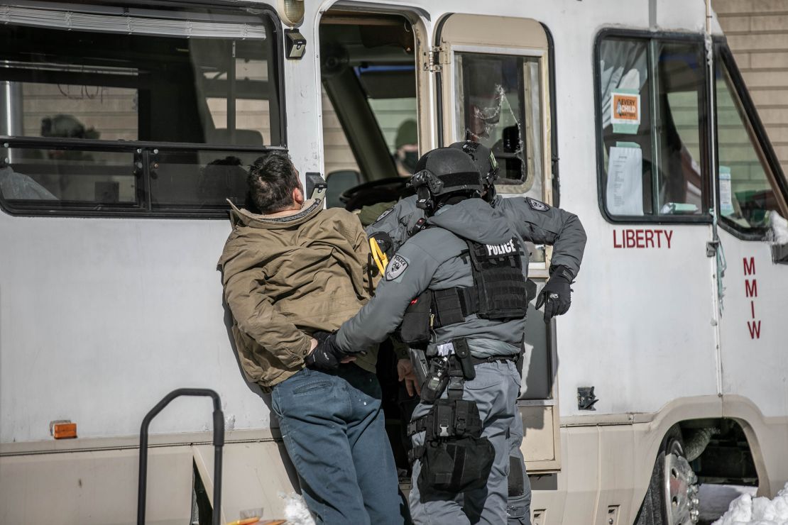 Canadian authorities carried out a massive operation at Ottawa's city center for protesters and trucks Friday