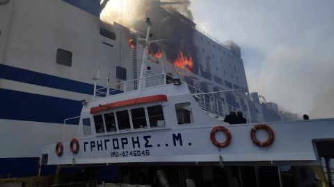 A vessel approaches the burning ferry on February 18.