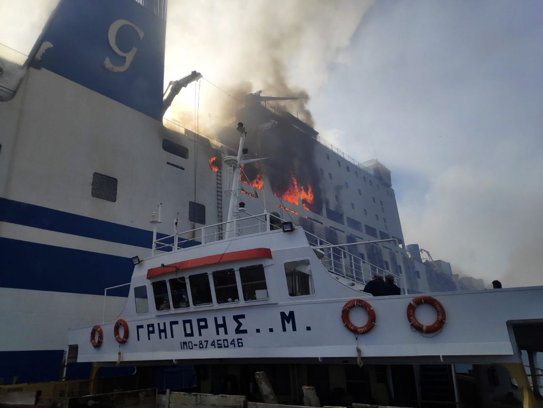 A vessel approaches the burning ferry on February 18.