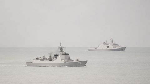 Two Chinese People's Liberation Army warships are seen in an image released by the Australian military after it said one of the ships endangered an Australian plane with a laser.