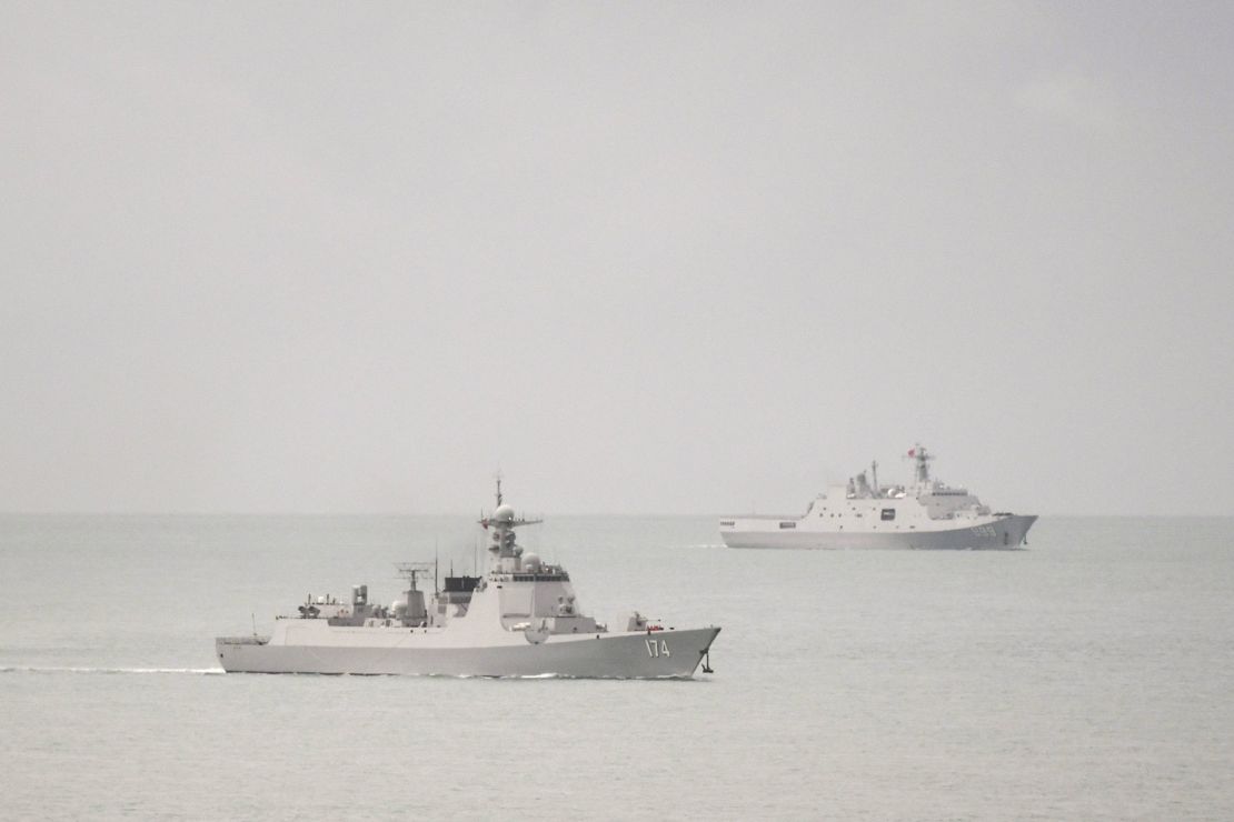 Two Chinese People's Liberation Army warships are seen in an image released by the Australian military after it said one of the ships endangered an Australian plane with a laser.