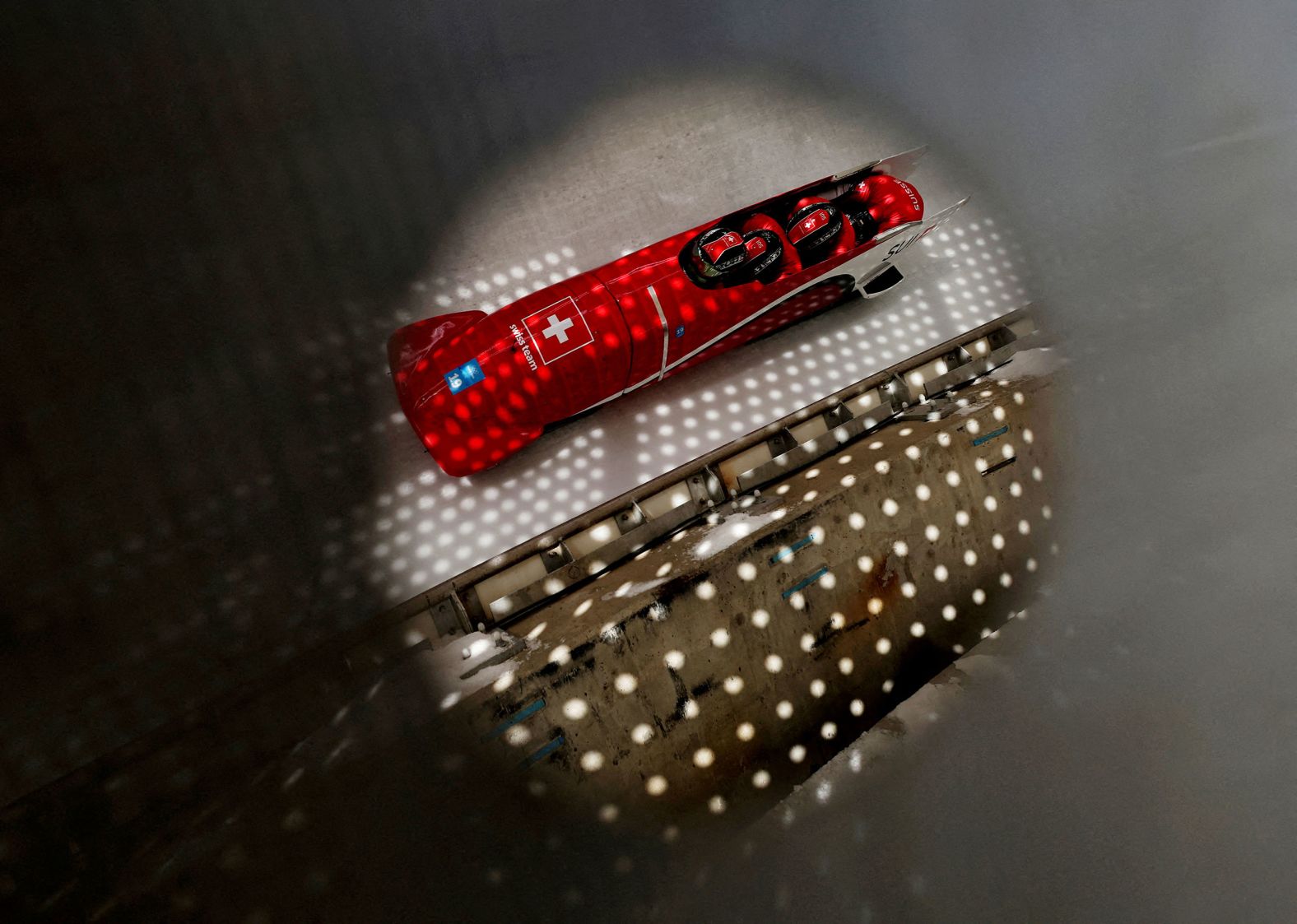 The Swiss bobsled team of Simon Friedli, Adrian Fassler, Fabio Badraun and Andreas Haas races down the track on February 19.