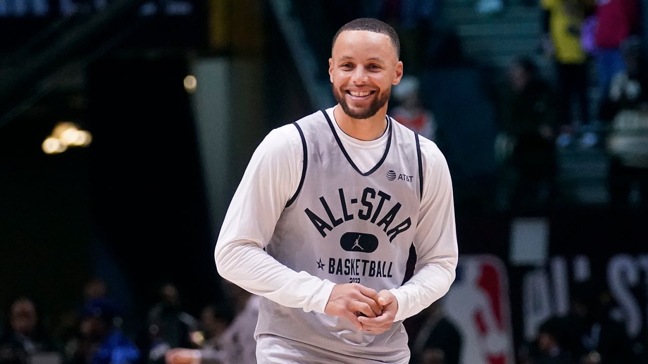 Stephen Curry smiles during a practice session in Cleveland, Saturday, Feb. 19, 2022.