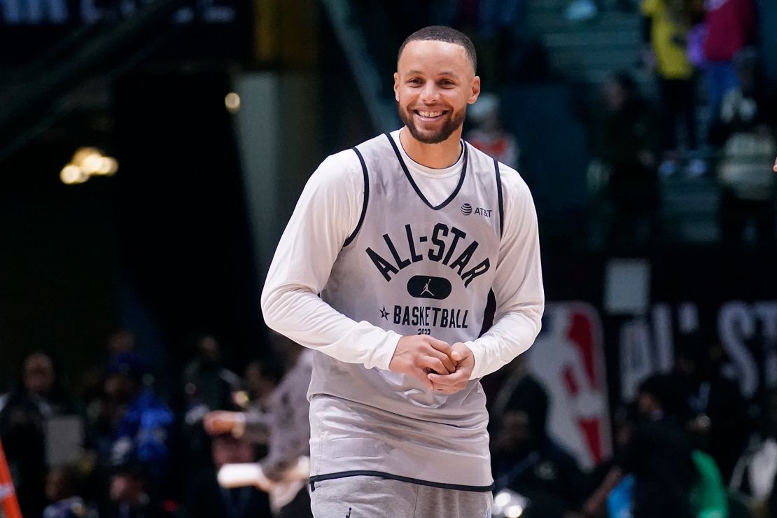 Stephen Curry smiles during a practice session in Cleveland, Saturday, Feb. 19, 2022.