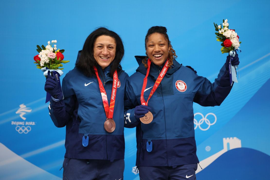 Strike a pose of joy ... Elana Meyers Taylor and Sylvia Hoffman of Team US celebrate their bronze medal following the two-woman bobsleigh competition.