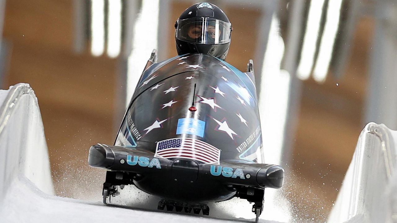 Meyers Taylor competes during the bobsleigh women's monobob heat at the National Sliding Centre in Yanqing District, Beijing, capital of China on February 14.