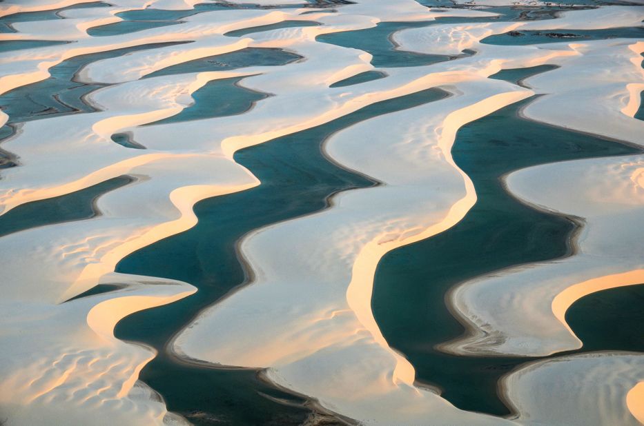 <strong>Undulating dunes:</strong> Two rivers carry sedimentary deposits to the Atlantic Ocean, but the deposits are subsequently driven miles inland by high winds in dry season. 