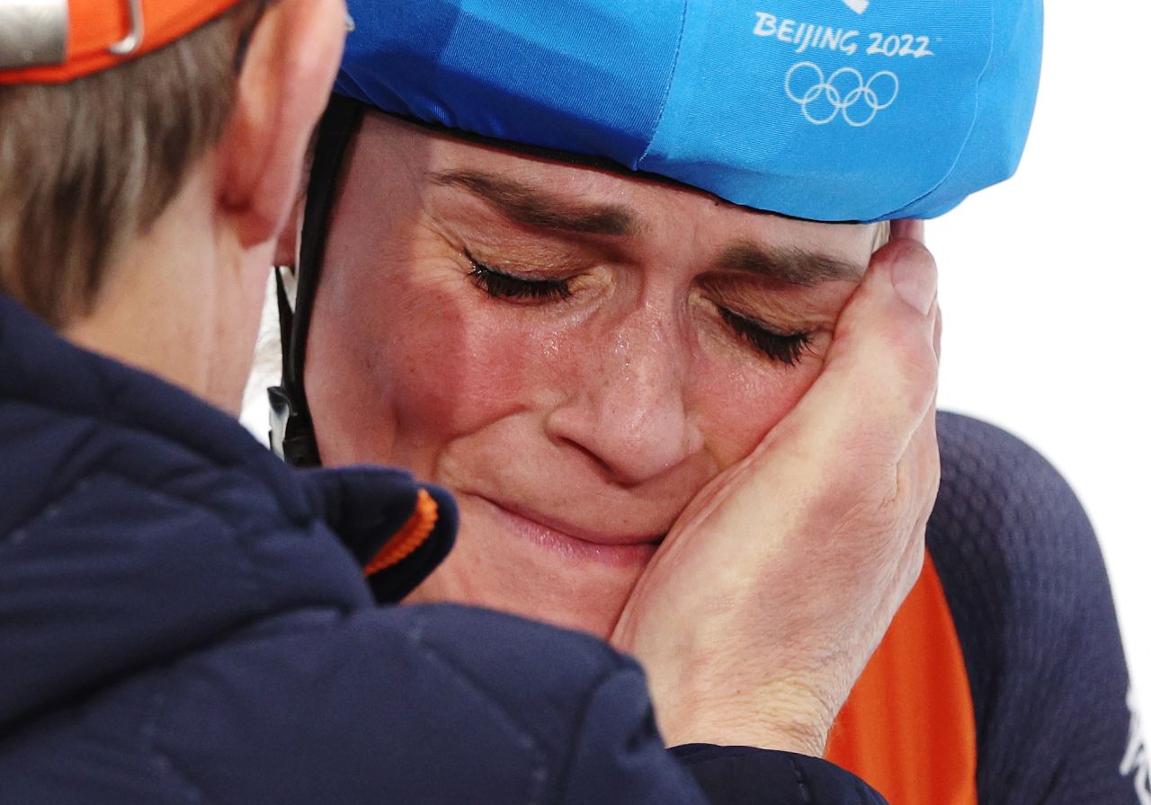 Dutch speedskater Irene Schouten celebrates with a teammate after winning gold in the mass start final on February 19. It was her third gold medal of this year's Olympics.