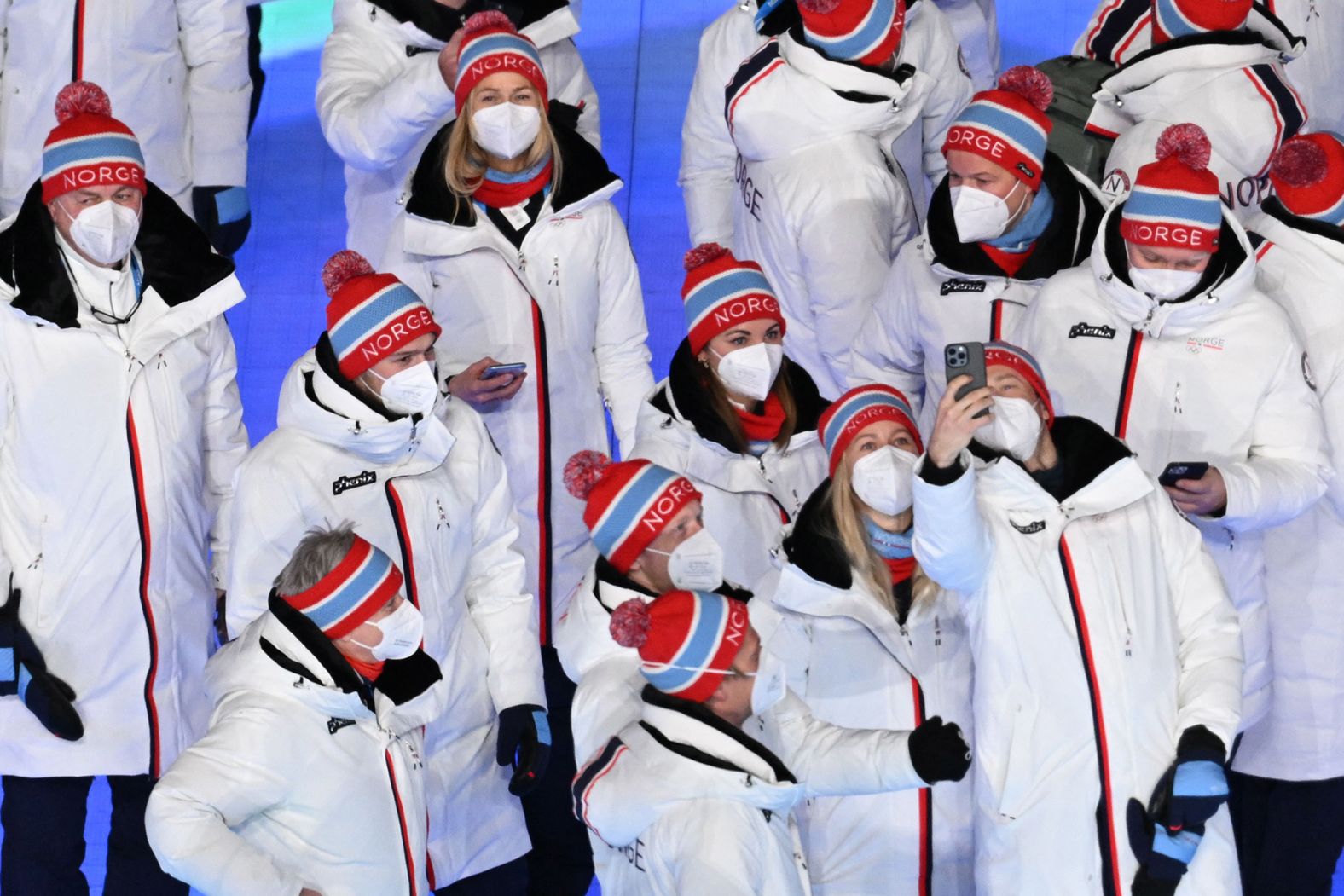 Norway's delegation enters the stadium during the closing ceremony. Norwegian athletes <a href="index.php?page=&url=https%3A%2F%2Fwww.cnn.com%2F2022%2F02%2F20%2Fsport%2Fnorway-beijing-2022-medal-table-spt-intl%2Findex.html" target="_blank">won the most medals in these Olympics</a> and set a record for most golds in one year by one country.