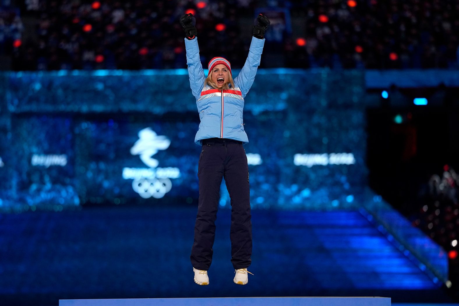 Therese Johaug, a cross-country skier from Norway, celebrates on a podium as she receives one of her gold medals during the closing ceremony. Johaug won three gold medals in Beijing, and <a href="index.php?page=&url=https%3A%2F%2Fwww.cnn.com%2Fworld%2Flive-news%2Fbeijing-winter-olympics-02-20-22-spt%2Fh_7d87c55c1539e56df6b9f26224f5fb1f" target="_blank">this latest one</a> was for the mass start event that she won on Saturday.