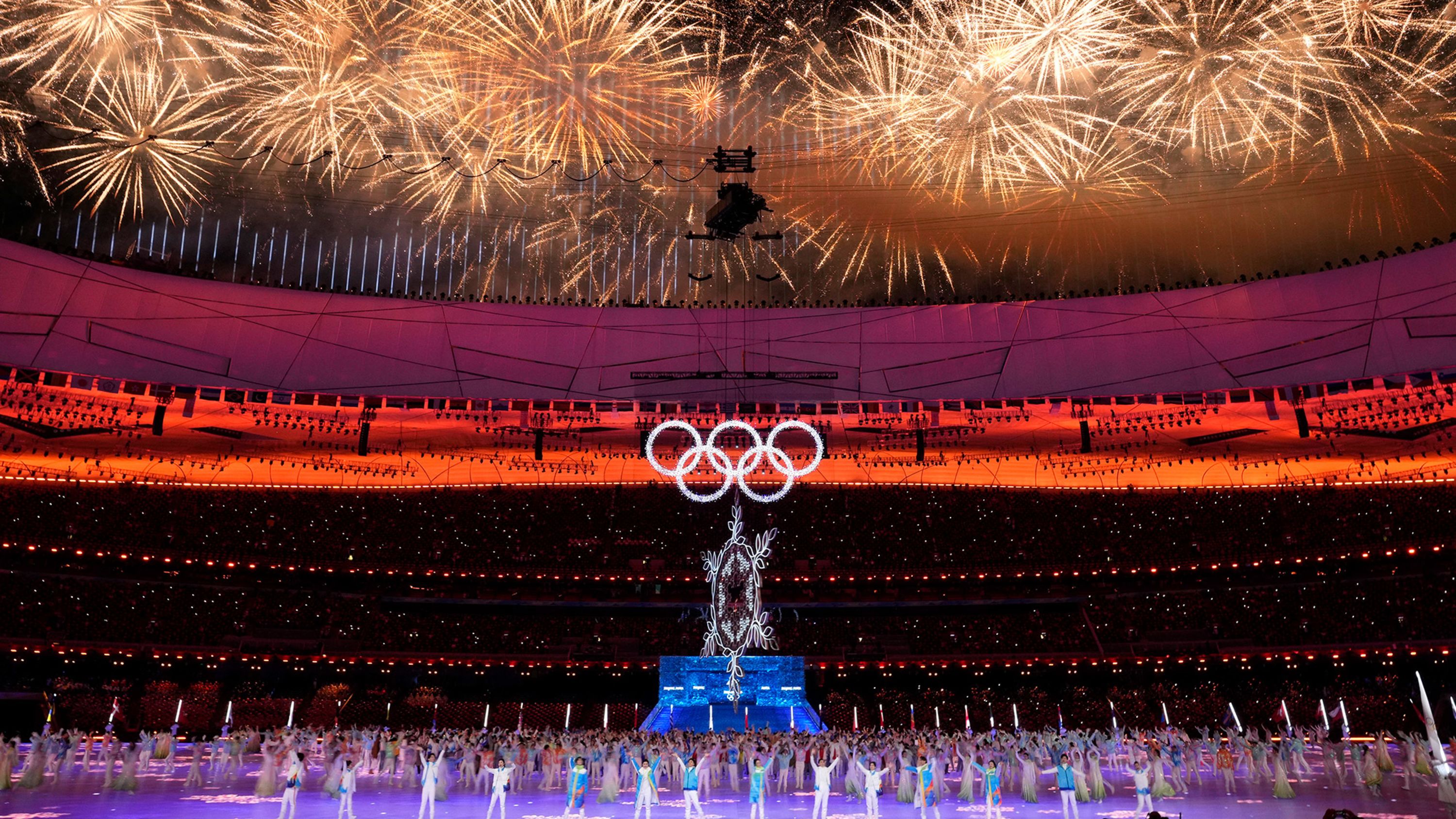 Fireworks burst over the Beijing National Stadium at the end of the Olympics closing ceremony on Sunday, February 20.