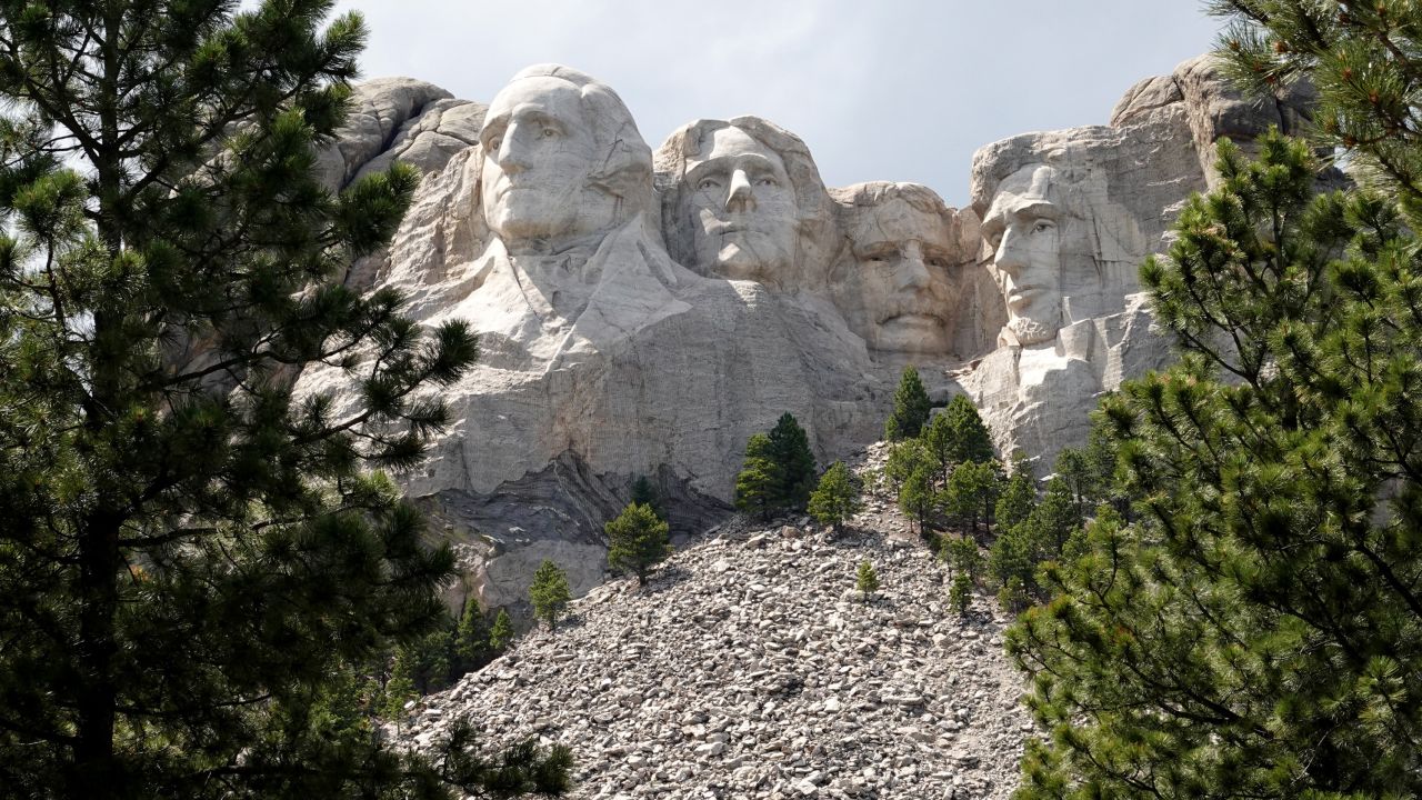 The busts of U.S. presidents George Washington, Thomas Jefferson, Theodore Roosevelt and Abraham Lincoln tower over the Black Hills at Mount Rushmore National Monument on July 1, 2020 in Keystone, South Dakota.