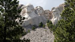 The busts of U.S. presidents George Washington, Thomas Jefferson, Theodore Roosevelt and Abraham Lincoln tower over the Black Hills at Mount Rushmore National Monument on July 1, 2020 in Keystone, South Dakota.