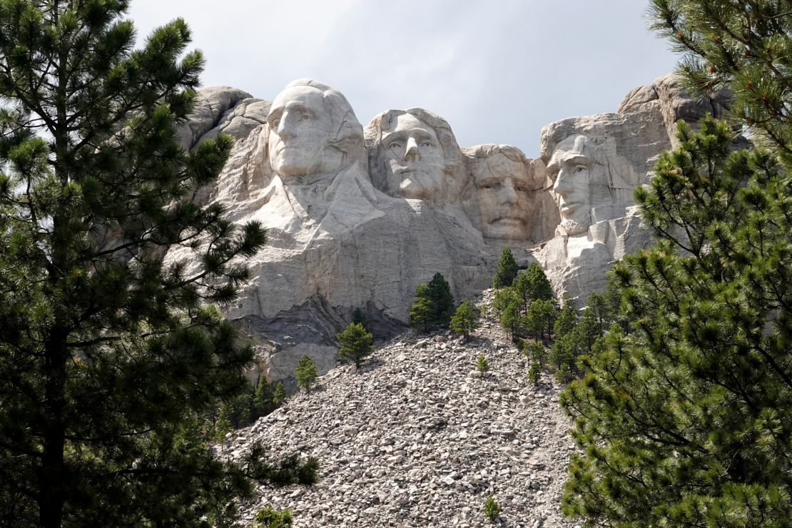 The busts of U.S. presidents George Washington, Thomas Jefferson, Theodore Roosevelt and Abraham Lincoln tower over the Black Hills at Mount Rushmore National Monument on July 1, 2020 in Keystone, South Dakota.