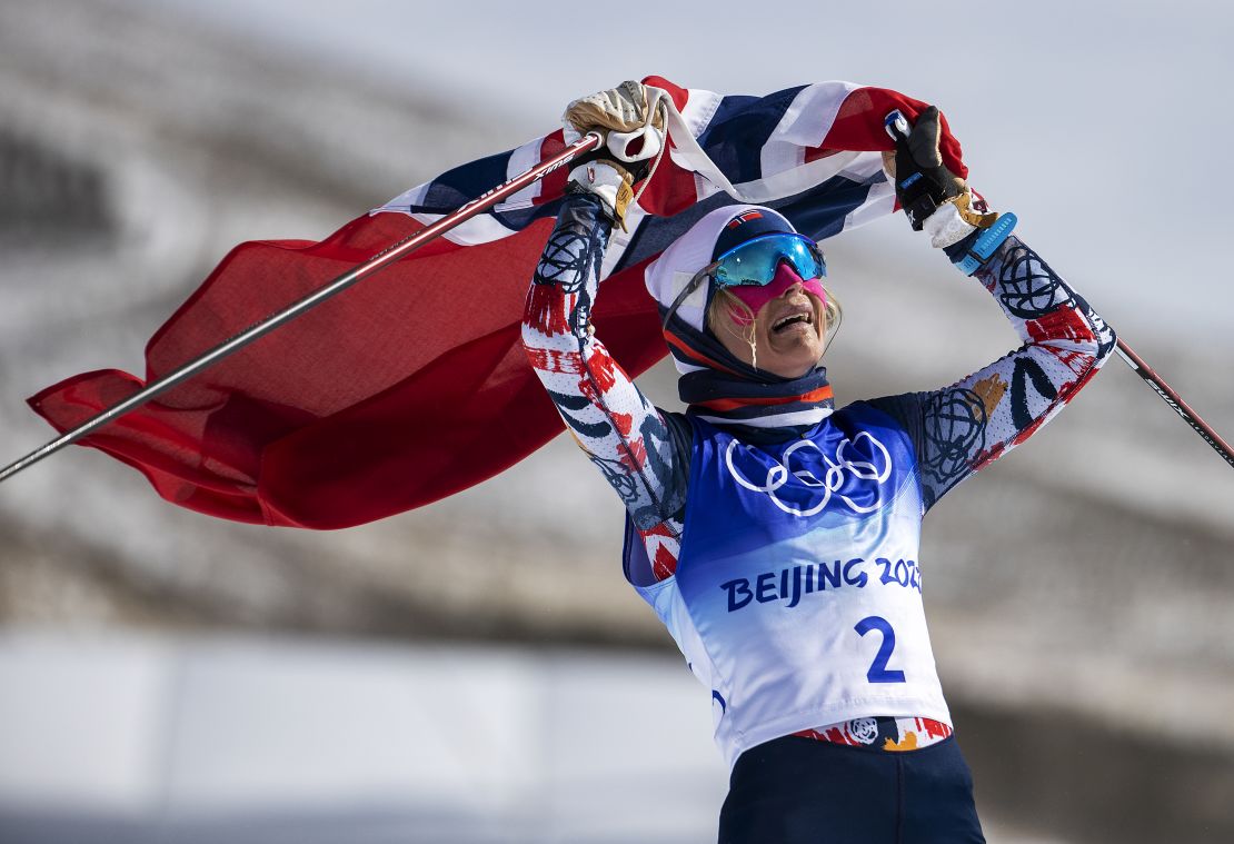 Norway's Therese Johaug celebrates winning gold in the 30km cross-country skiing on Saturday.