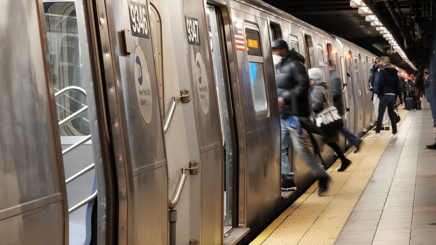 People board a subway on January 19, in New York City. 