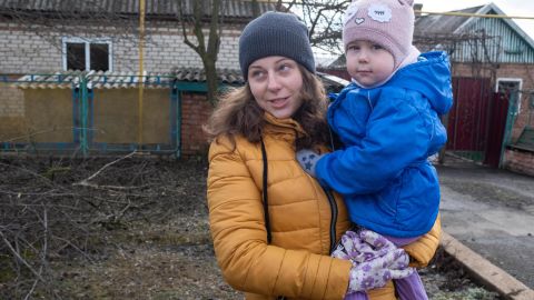 Liudmila Ponomarenko says that her daughter doesn't understand the steady sounds of shelling. "Very soon, she will understand, because she's three. So now we're thinking about whether we stay here."
