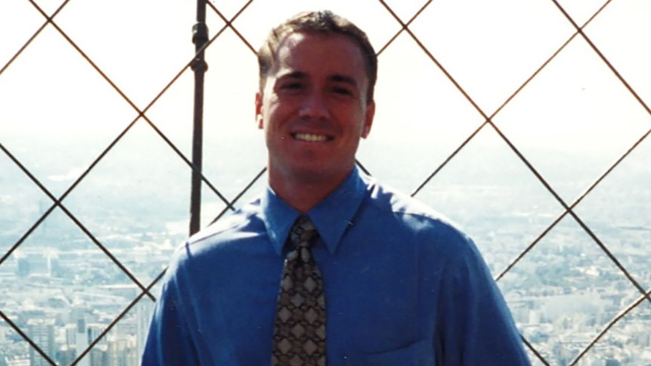Esther took this photograph of Dan on top of the Eiffel Tower on the day they met in 1998.