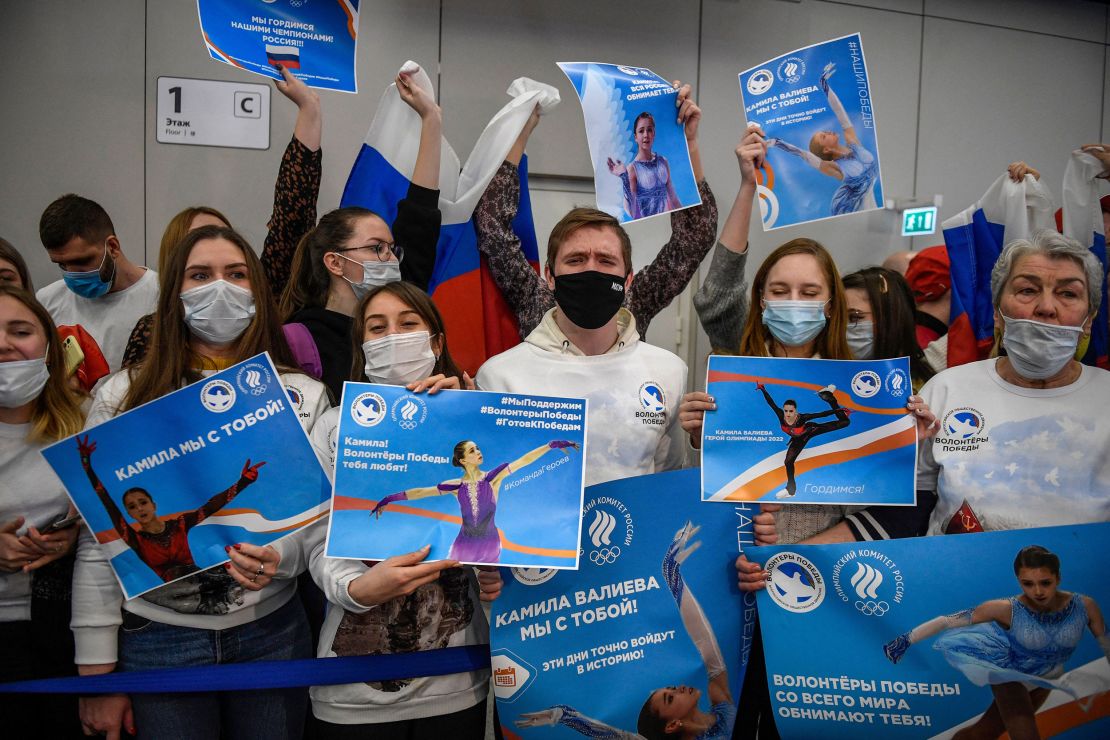 Supporters of Valieva await the figure skater's arrival at the Sheremetevo airport outside Moscow.