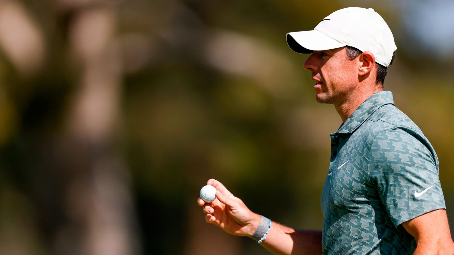 Rory McIlroy waves on the 13th green during the final round of the Genesis Invitational at Riviera Country Club on February 20.