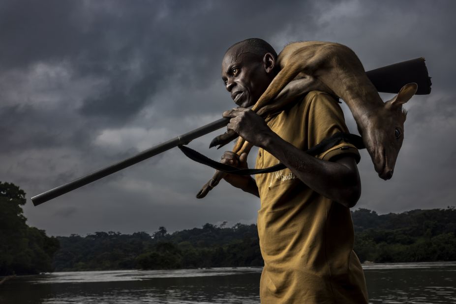 In a series called "Bushmeat Hunters," Portraiture category finalist Brent Stirton frames hunters with their wild game in a way that evokes traditional paintings of huntsmen.