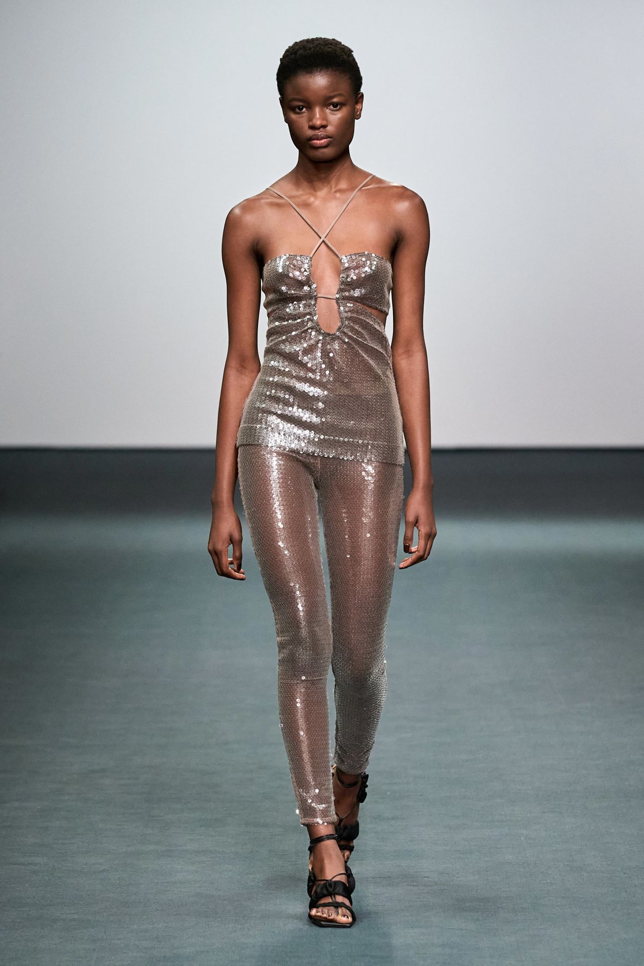 Dojaka digressed from her typical monochrome palette to include two sequined looks.