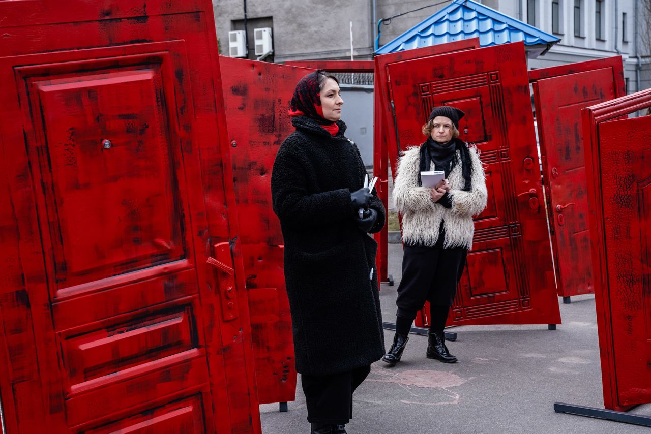 Activists hold a performance in front of the Russian embassy in Kyiv on February 21 in support of prisoners who were arrested in Crimea. They say the red doors are a symbol of the doors that were kicked in to search and arrest Crimean Tatars, a Muslim ethnic minority.