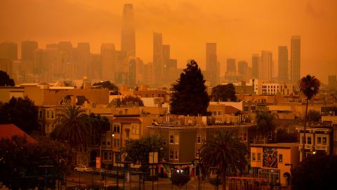A hazy San Francisco skyline is seen from Dolores Park in September 2020 as more than 300,000 acres burned across the state.
