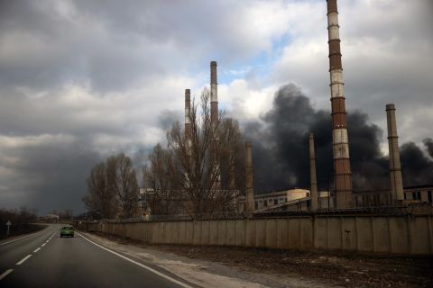 Smoke rises from a damaged power plant in Shchastya that Ukrainian authorities say was hit by shelling on Tuesday, February 22.