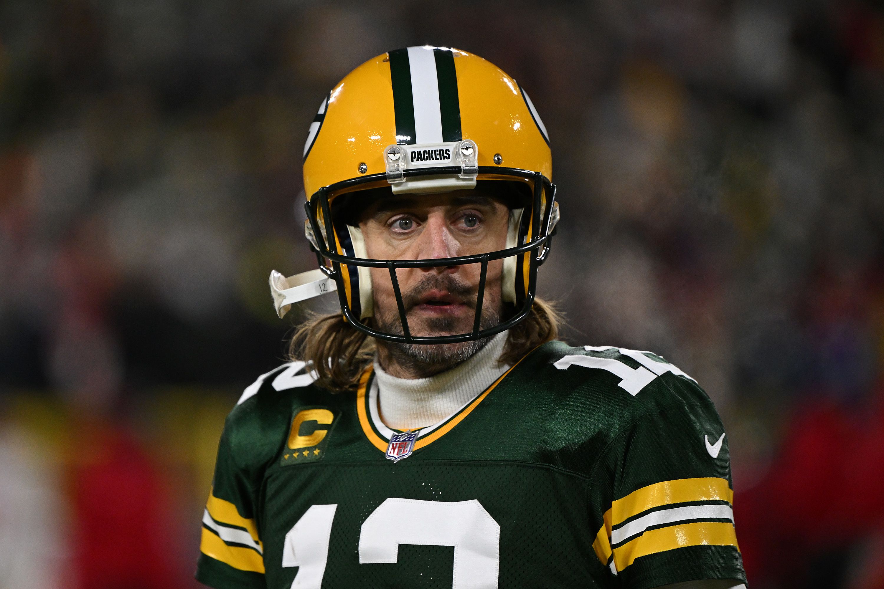 Aaron Rodgers: Star quarterback says he will stay with the Green