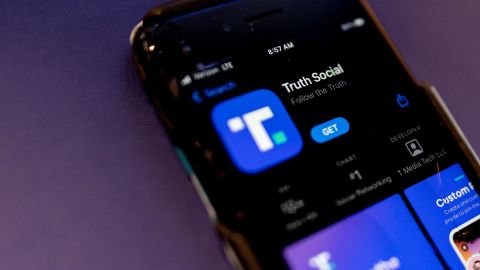 A phone screen displays the Truth Social app in Washington, DC, on February 21, 2022.