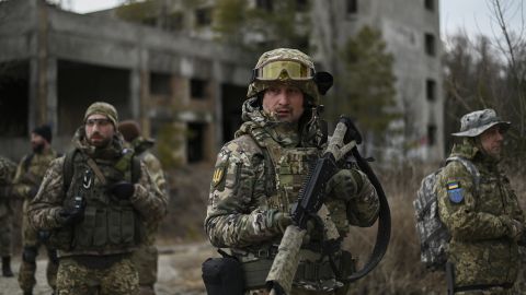 Ukrainian civilian volunteers and reservists of the Kyiv Territorial Defense unit conduct weekly combat training in an abandoned asphalt factory on February 19, as Russian forces continue to mobilize on the Ukrainian border.