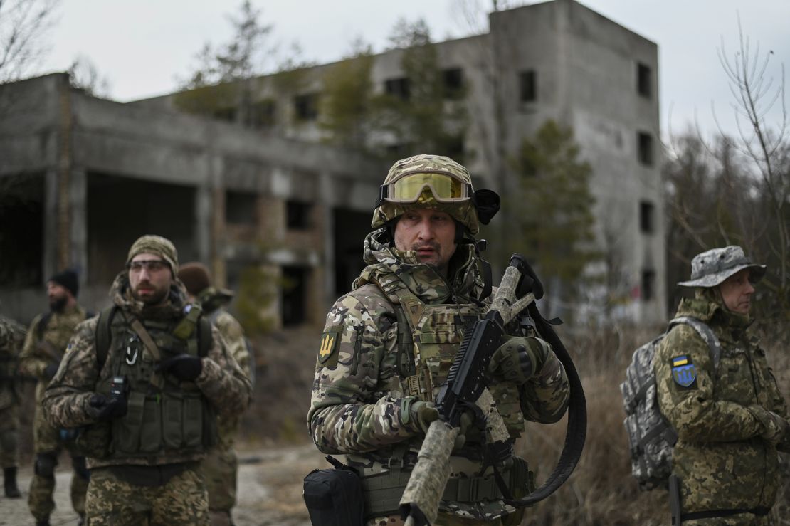 Ukrainian civilian volunteers and reservists of the Kyiv Territorial Defense unit conduct weekly combat training in an abandoned asphalt factory on February 19, as Russian forces continue to mobilize on the Ukrainian border.