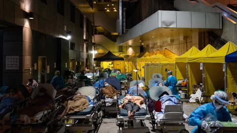 Covid patients wait for medical treatment at a temporary shelter in Hong Kong on February 16, 2022.