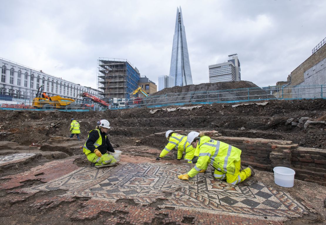 MOLA archaeologists at work on the mosaic near the Shard.
