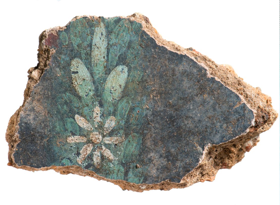 An early Roman decorated wall plaster found during excavation.