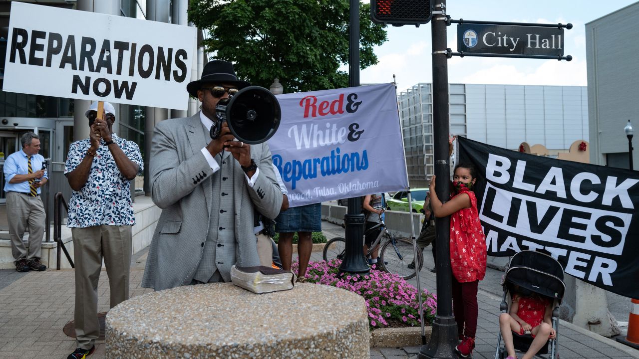 The Rev. Robert Turner leads a protest to demand reparations, at Tulsa City Hall in Tulsa, Okla., last year