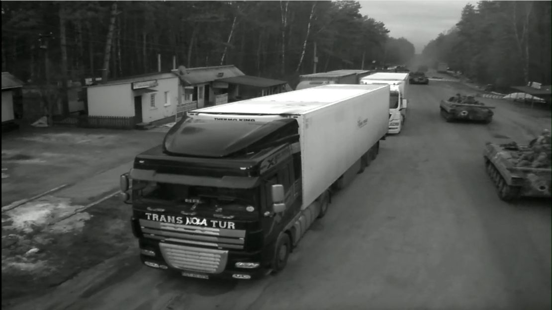 Military vehicles are seen on a livestream video entering Ukraine from Belarus.