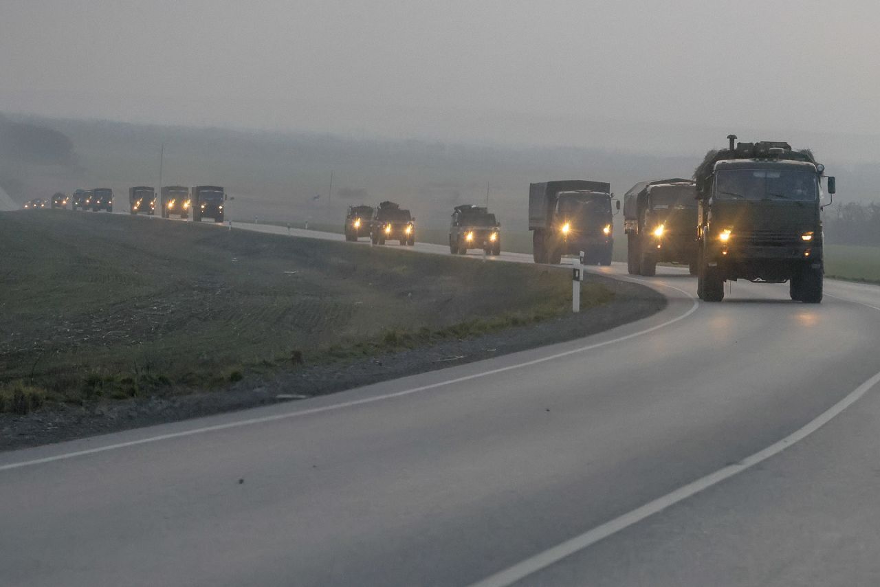A convoy of Russian military vehicles is seen February 23 in the Rostov region of Russia, which runs along Ukraine's eastern border.  Zelensky says Russia waging war so Putin can stay in power &#8216;until the end of his life&#8217; w 1280