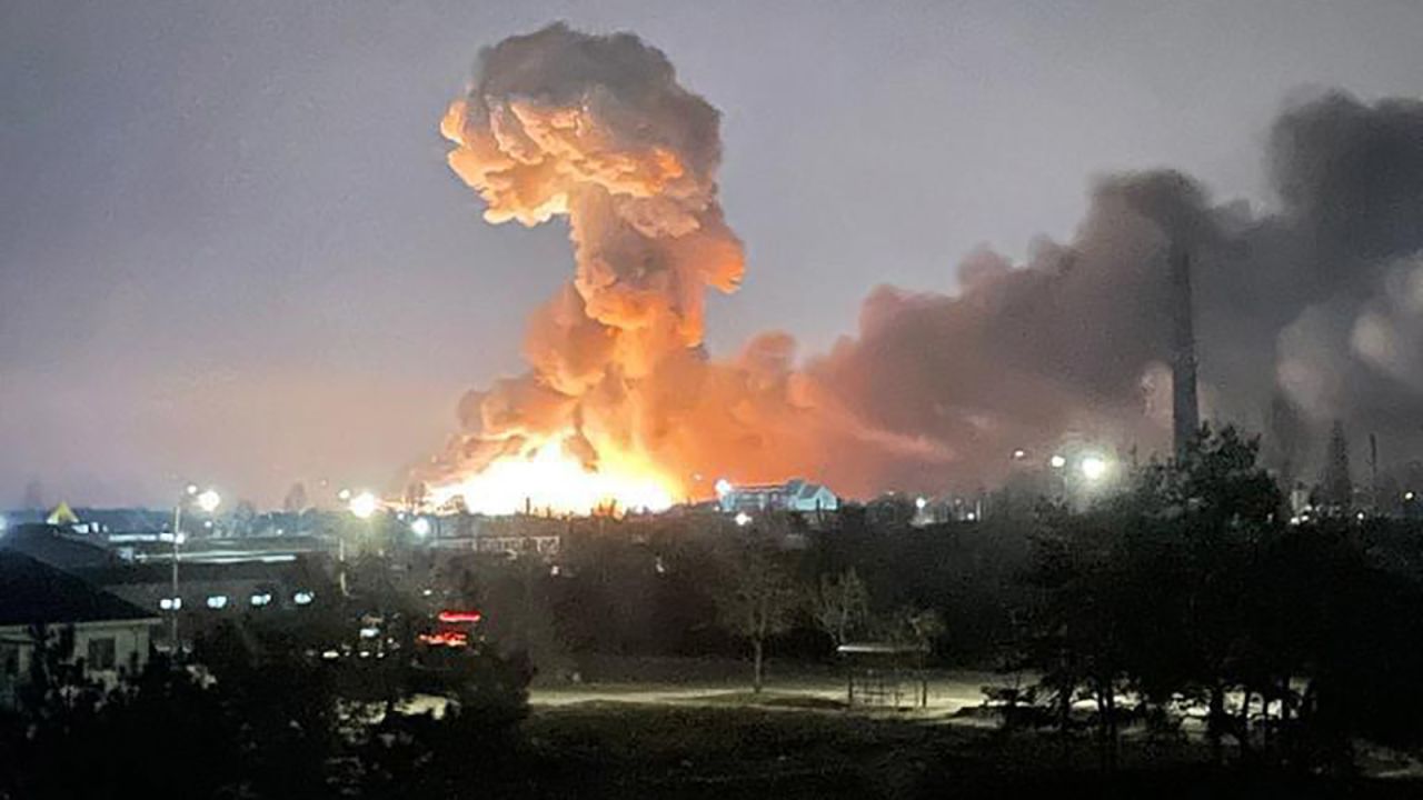 A photo provided by the Ukrainian President's office appears to show an explosion in Kyiv early on February 24.