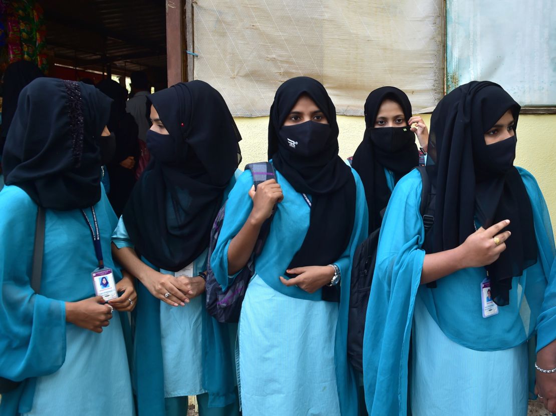 Muslim students leave their school in Udupi, Karnataka, after they were denied entry on February 16, 2022. 