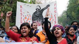 Students and activists hold a banner while shouting slogans during a demonstration in Karnataka after Muslim students were told not to wear hijabs in schools. 
